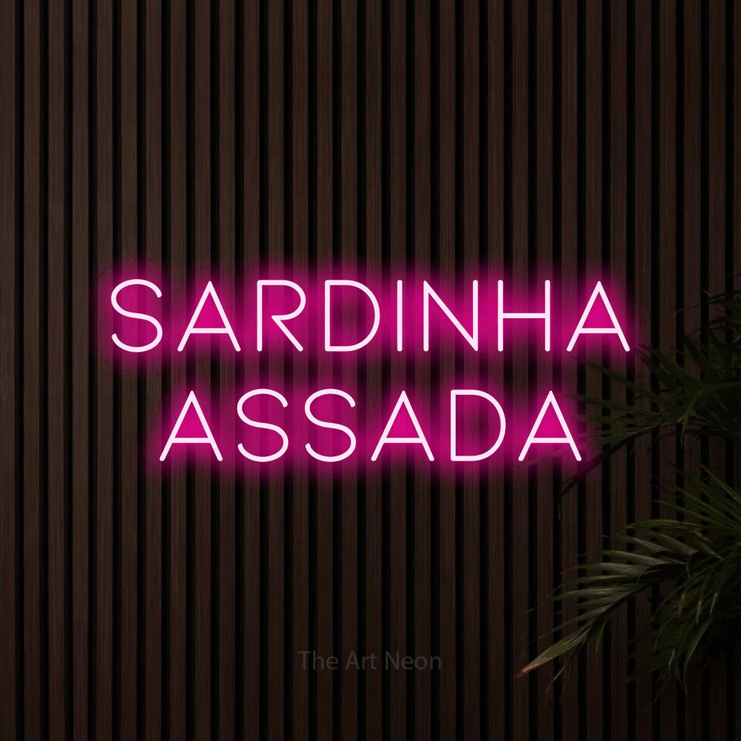 LED neon sign reading “sardinha assada”, arranged in 2 lines.