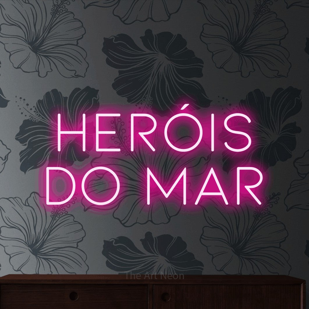 LED neon sign reading “heróis do mar”, arranged in 2 lines.
