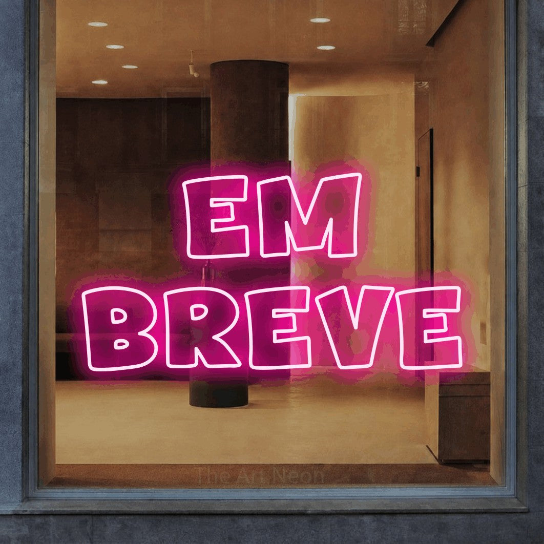 LED neon sign reading “em breve”, arranged in 2 lines.