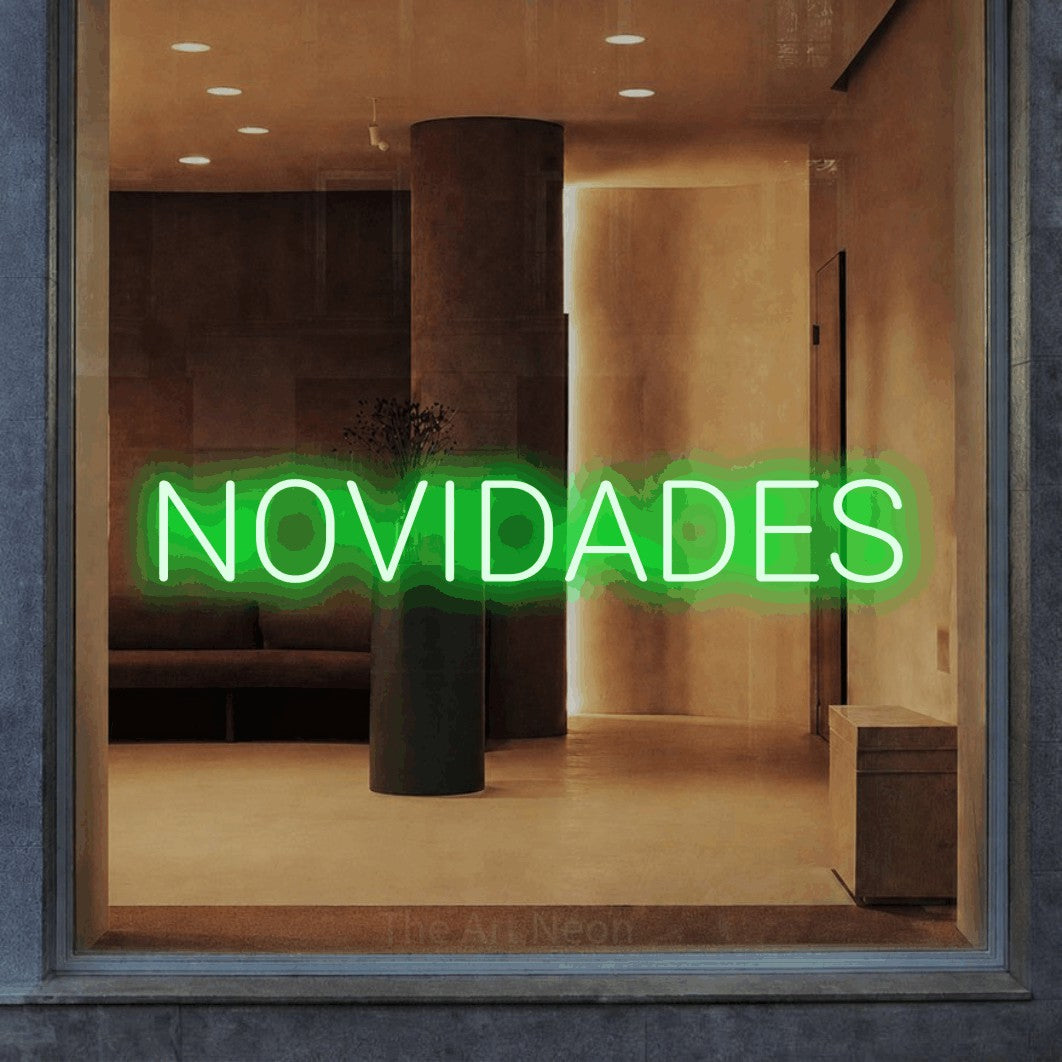 LED neon sign reading “NOVIDADES”, arranged in a single line.