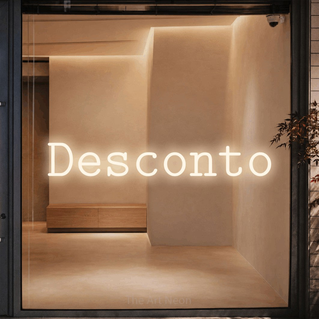 LED neon sign reading “Desconto”, arranged in a single line.