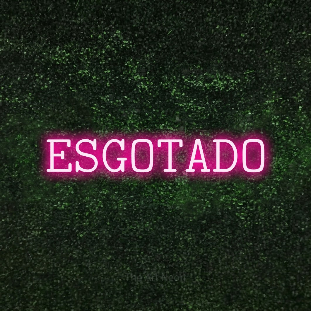 LED neon sign reading “ESGOTADO”, arranged in a single line.