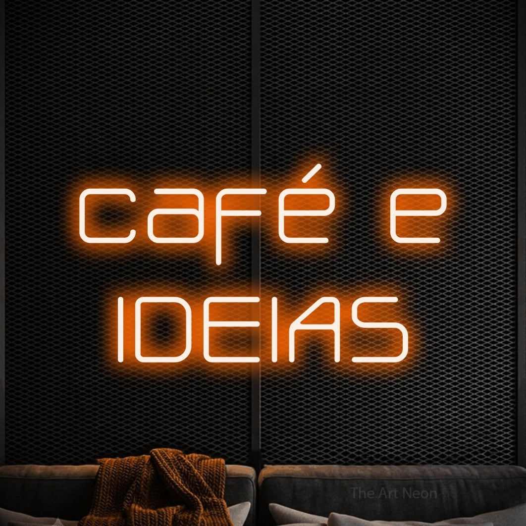LED neon sign reading “café e IDEIAS”, arranged in 2 lines.