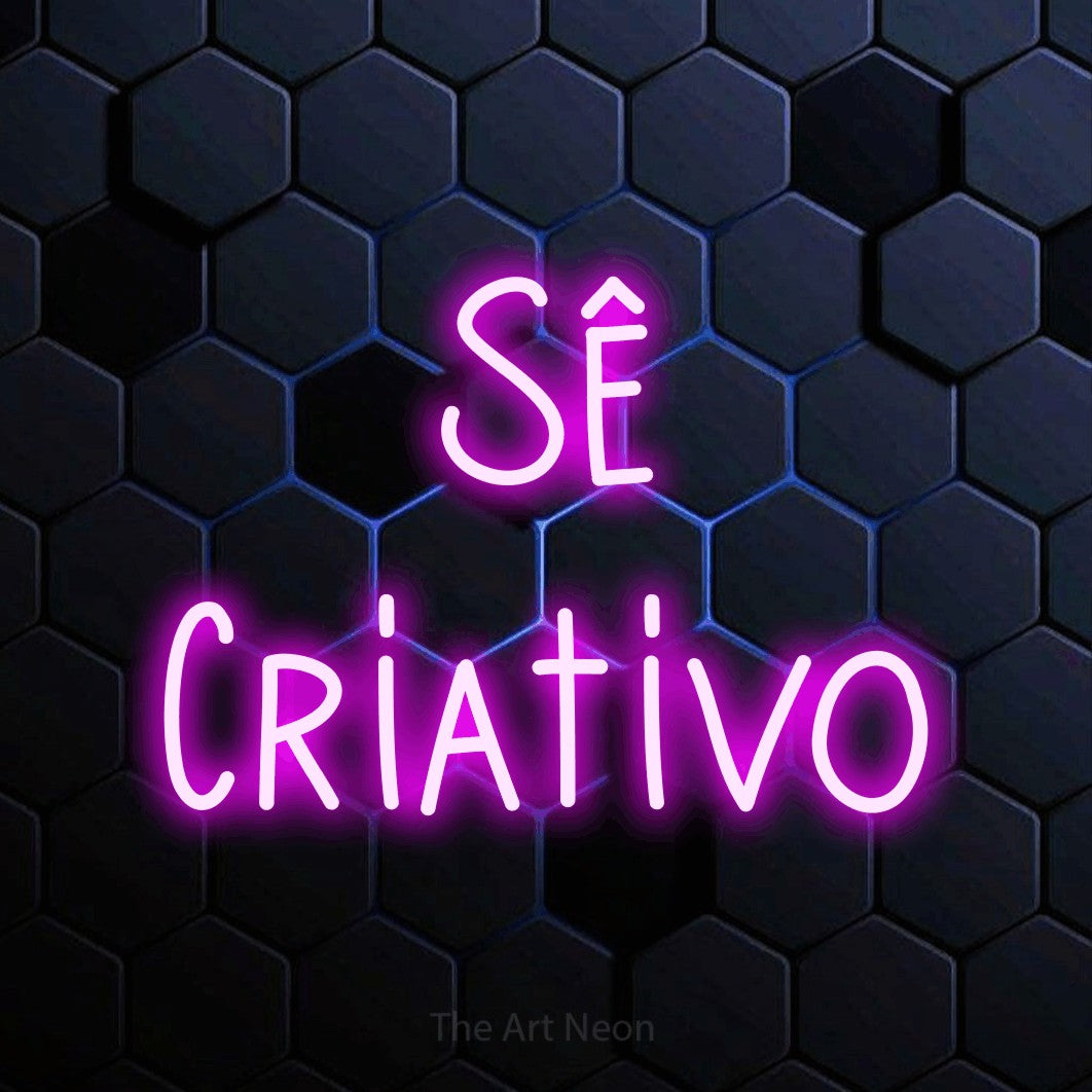 LED neon sign reading “Sê Criativo”, arranged in 2 lines.