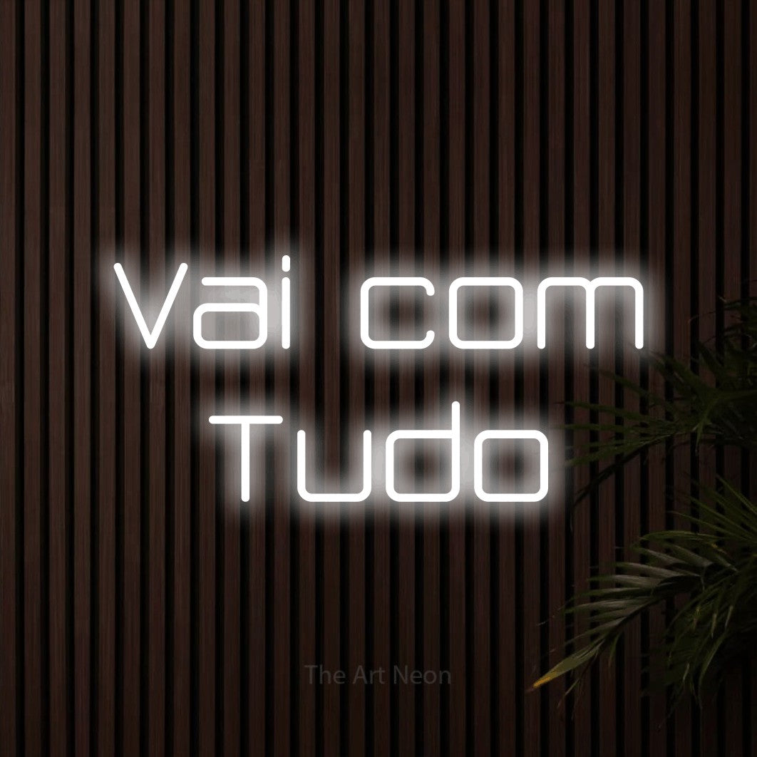 LED neon sign reading “Vai com Tudo”, arranged in 2 lines.