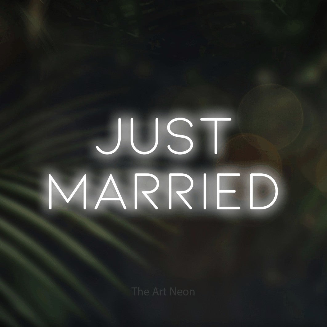 LED neon sign reading “Just Married”, arranged in 2 lines.