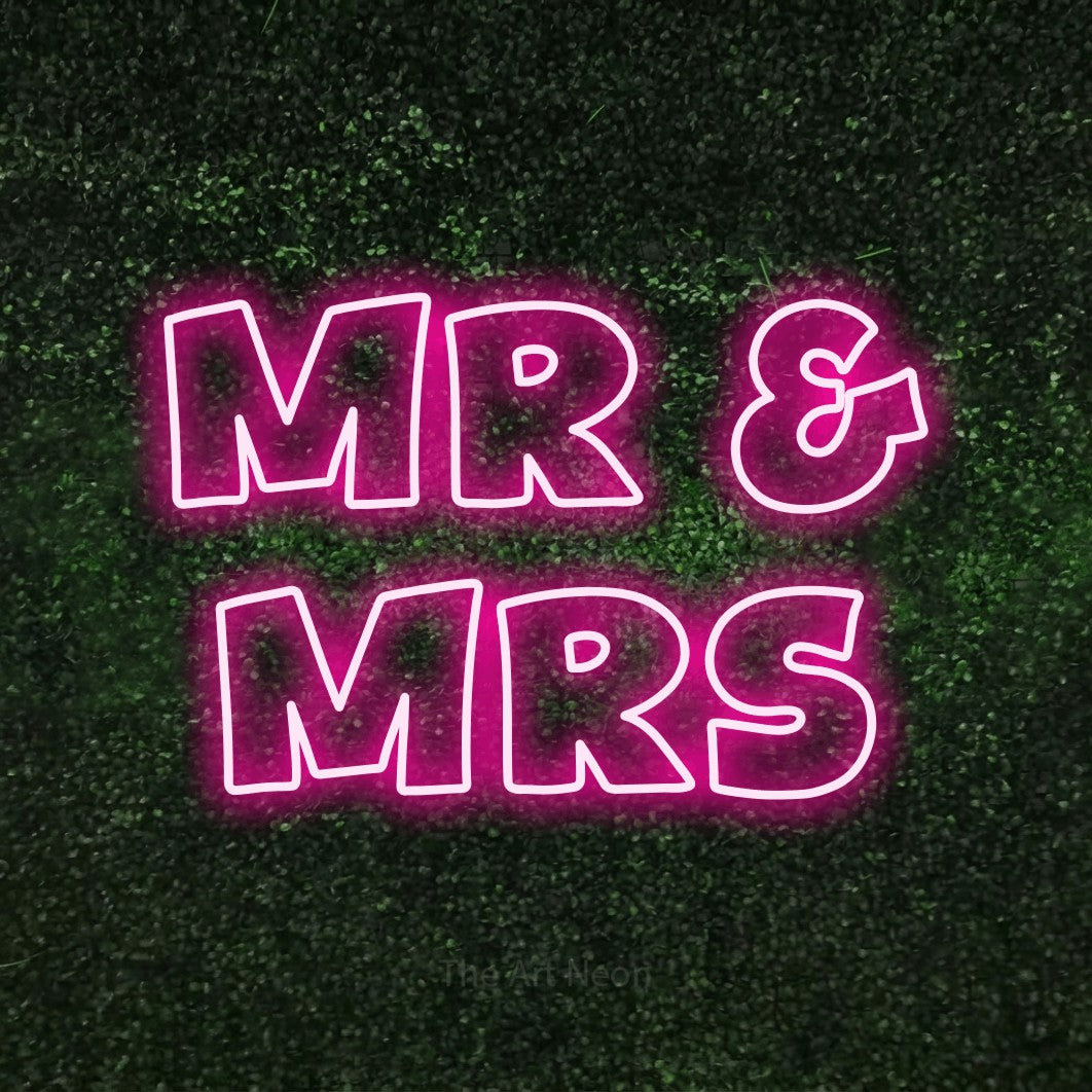 LED neon sign reading “MR & MRS”, arranged in 2 lines.