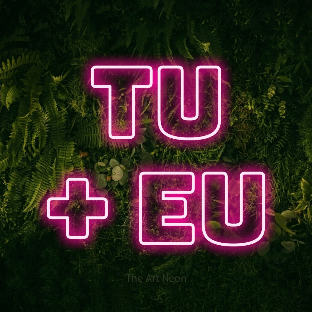 LED neon sign reading “Tu + Eu”, arranged in 2 lines.