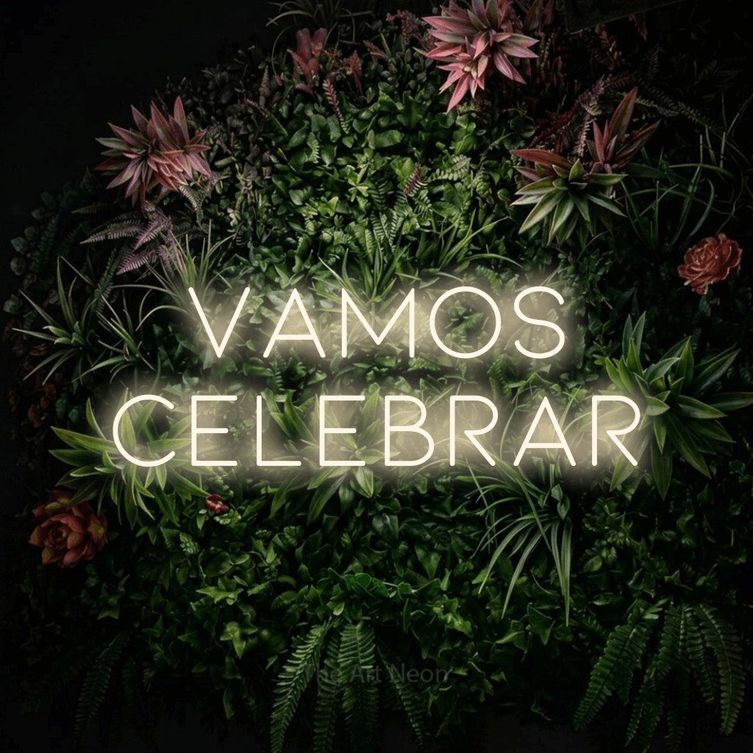 LED neon sign reading “vamos celebrar”, arranged in 2 lines.