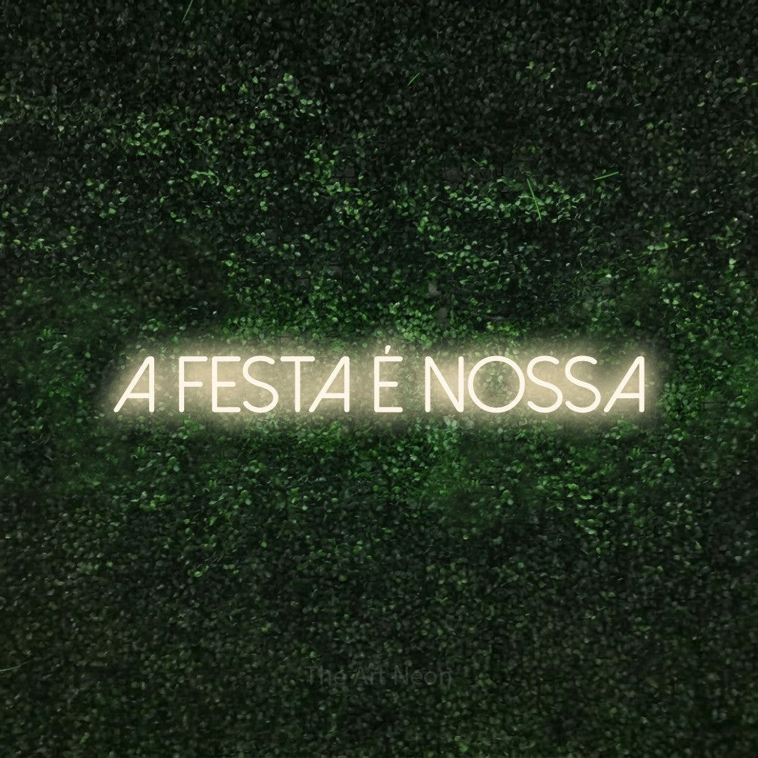 LED neon sign reading “A Festa É Nossa”, arranged in a single line.
