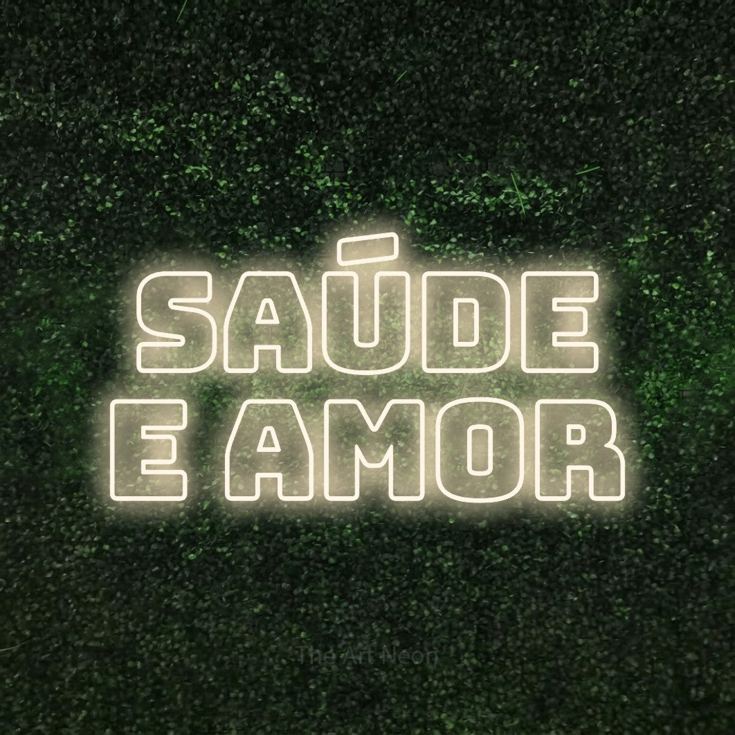 LED neon sign reading “saúde e amor”, arranged in 2 lines.