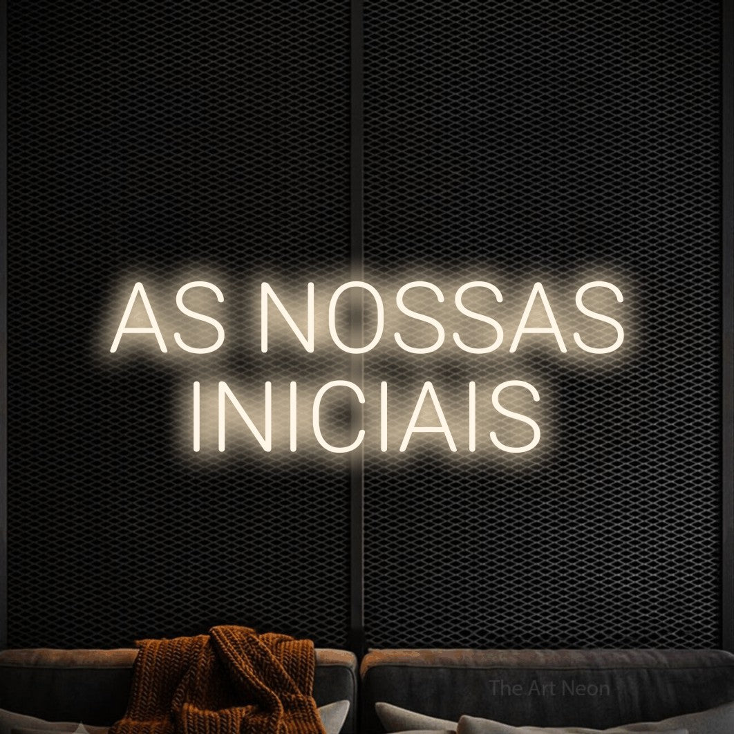 LED neon sign reading “AS NOSSAS INICIAIS”, arranged in 2 lines.