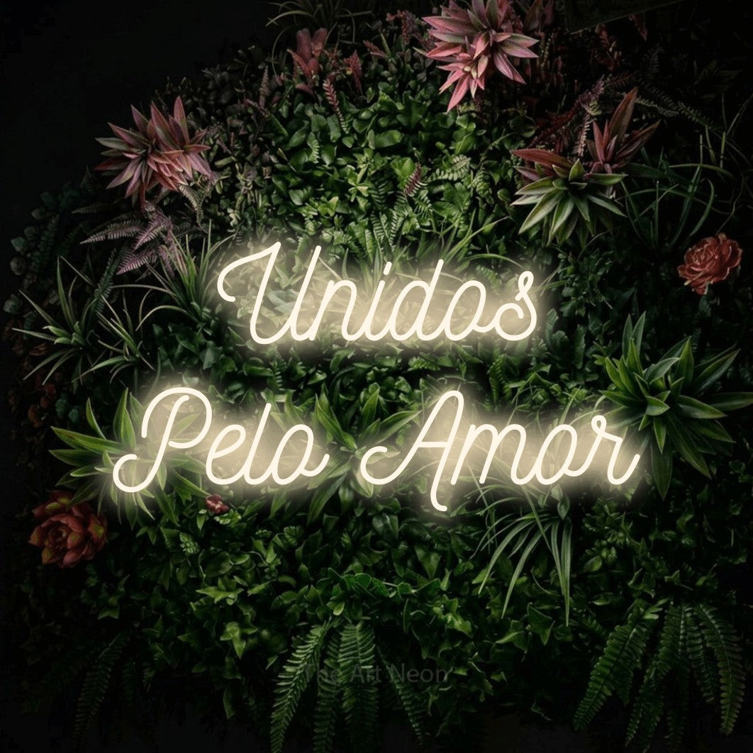 LED neon sign reading “Unidos Pelo Amor”, arranged in 2 lines.