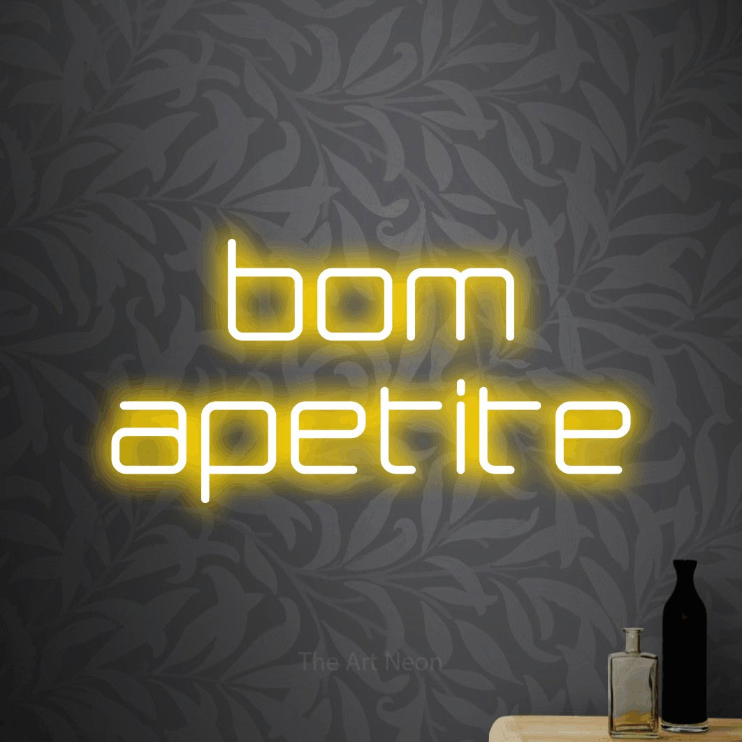 LED neon sign reading “bom apetite”, arranged in 2 lines.
