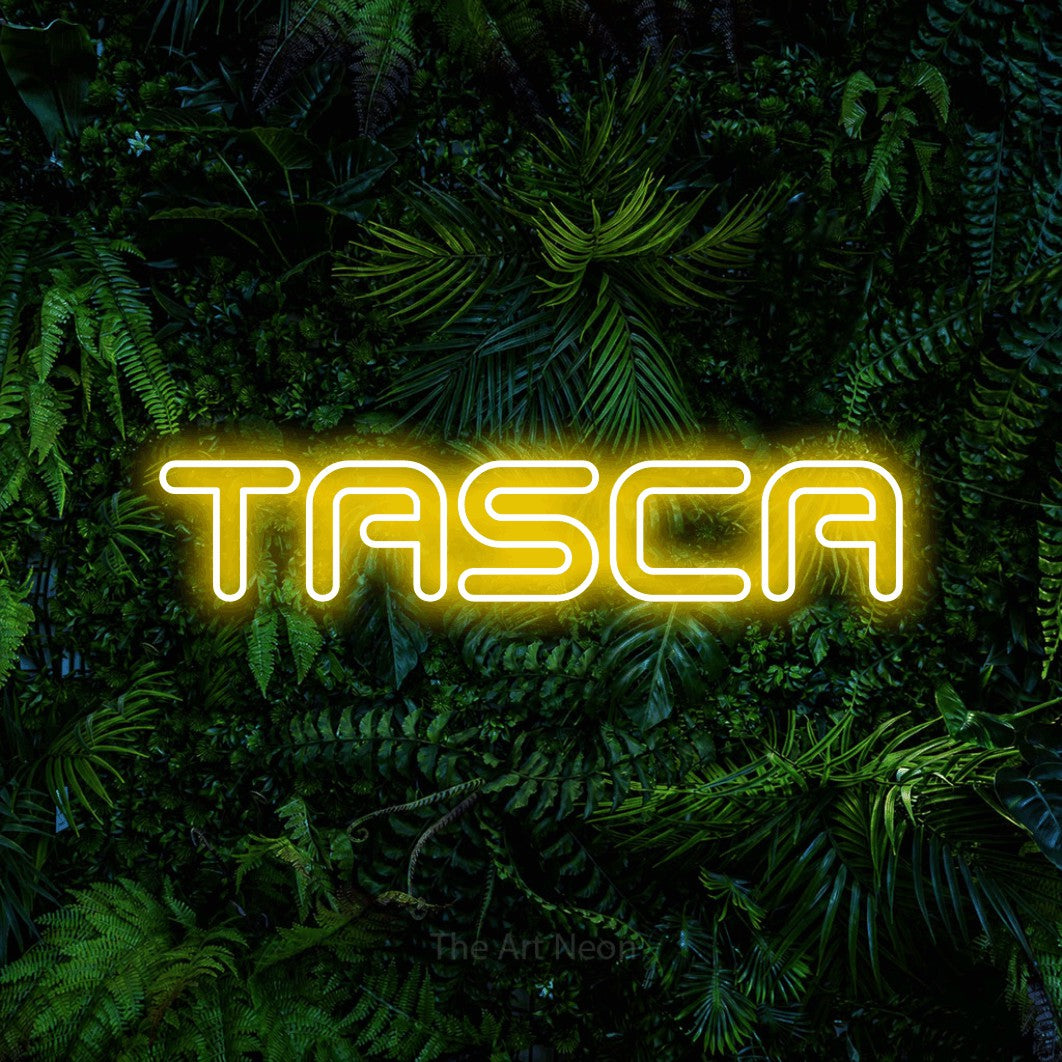 LED neon sign reading “TASCA”, arranged in a single line.