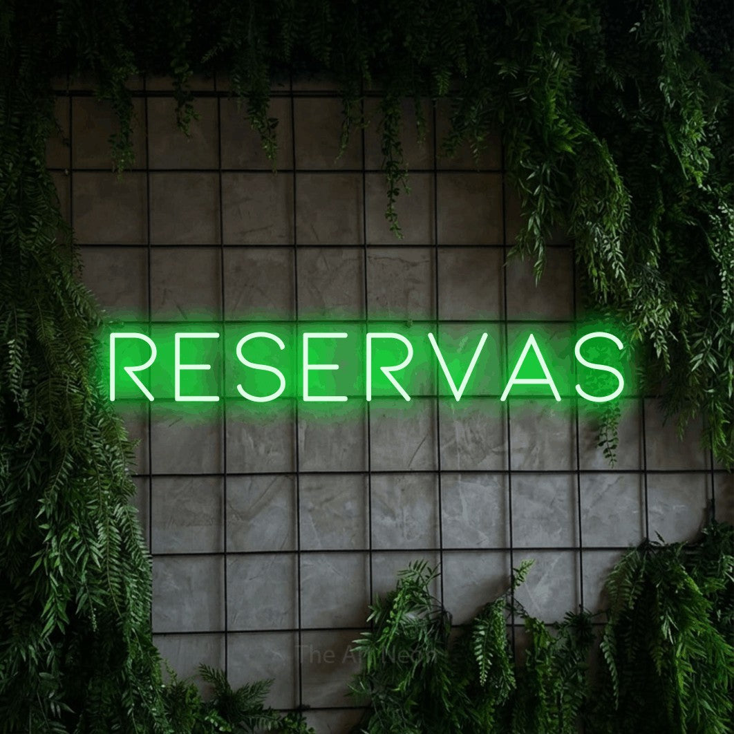 LED neon sign reading “Reservas”, arranged in a single line.
