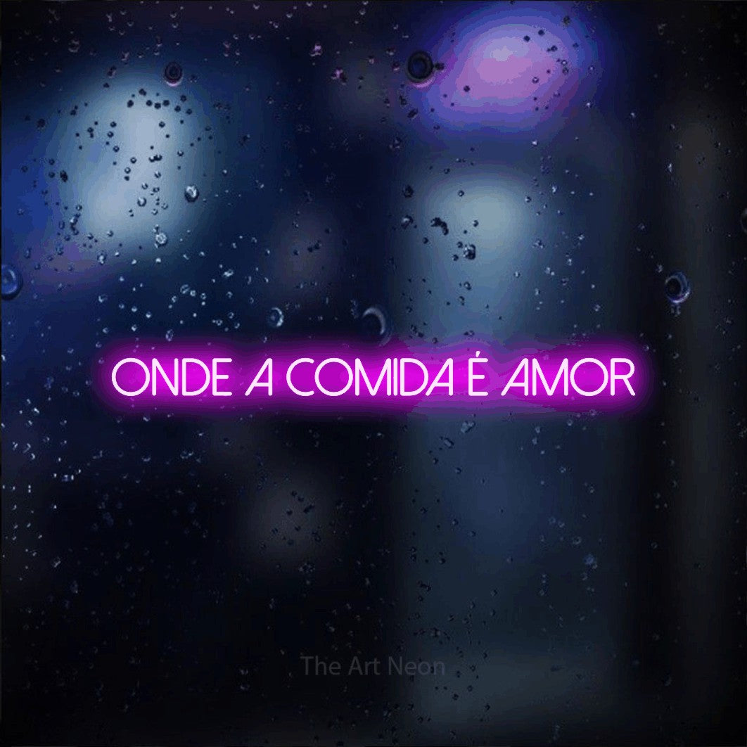 LED neon sign reading “onde a comida é amor”, arranged in a single line.