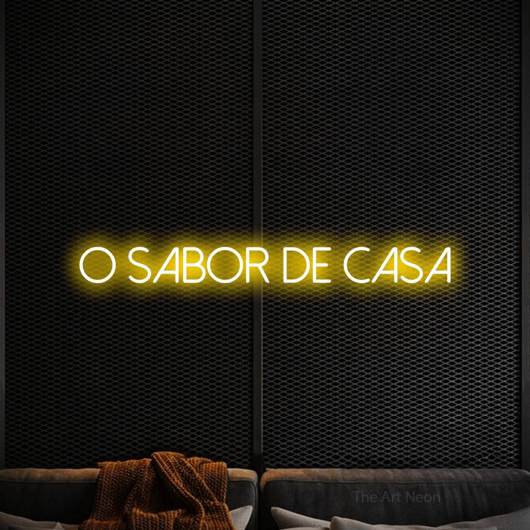 LED neon sign reading “O SABOR DE CASA”, arranged in a single line.