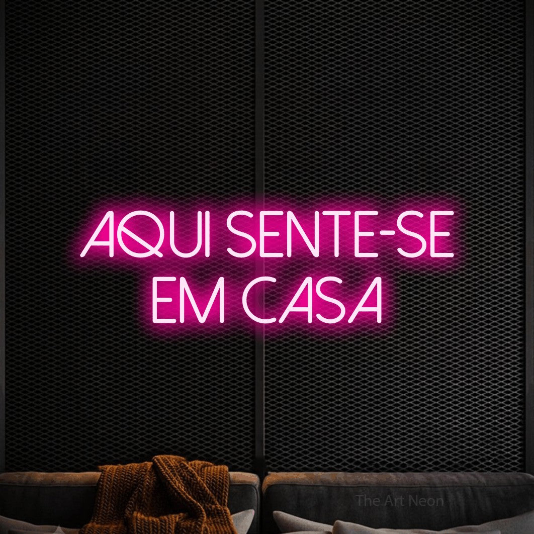 LED neon sign reading “Aqui Sente-se em Casa”, arranged in 2 lines.