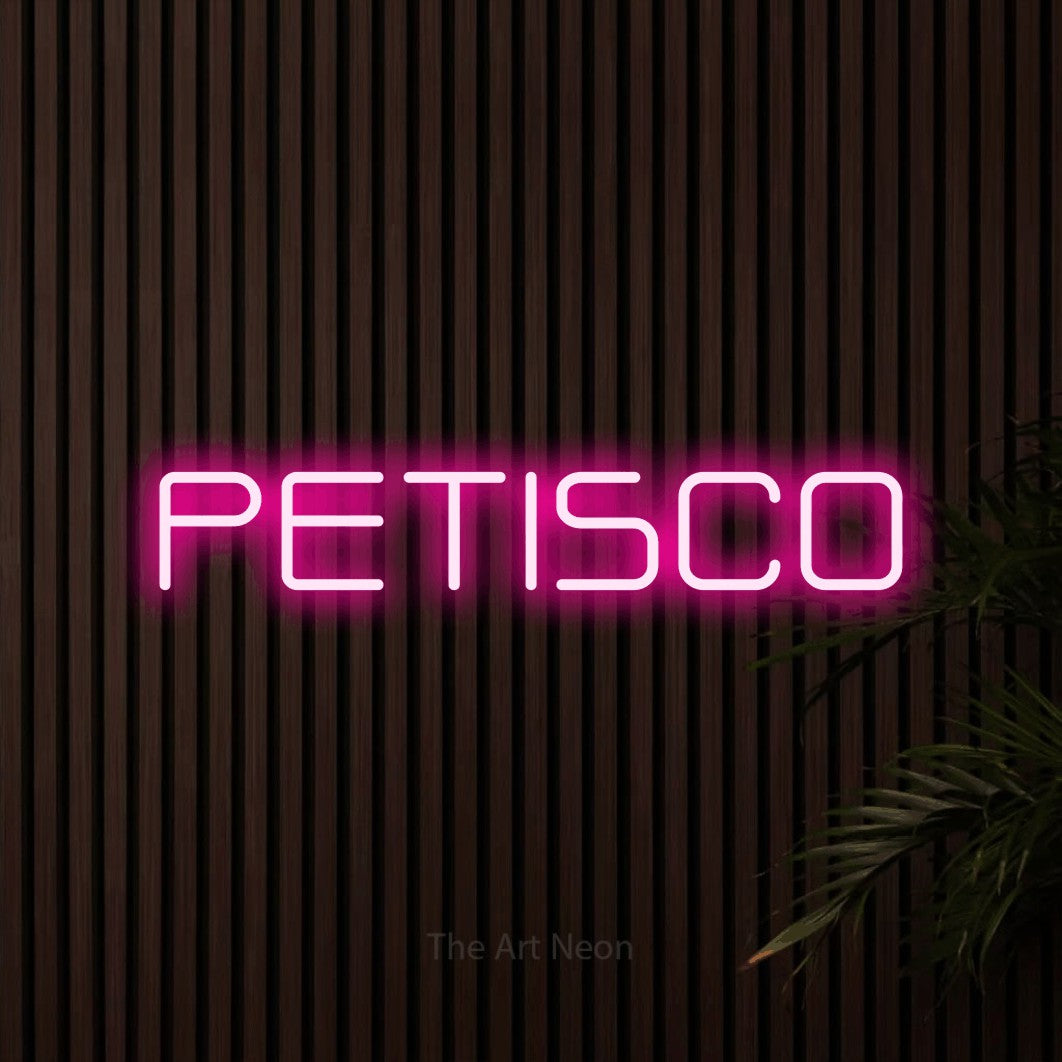 LED neon sign reading “PETISCO”, arranged in a single line.