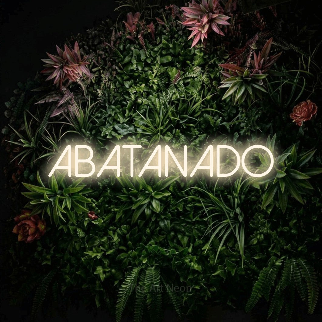 LED neon sign reading “abatanado”, arranged in a single line.