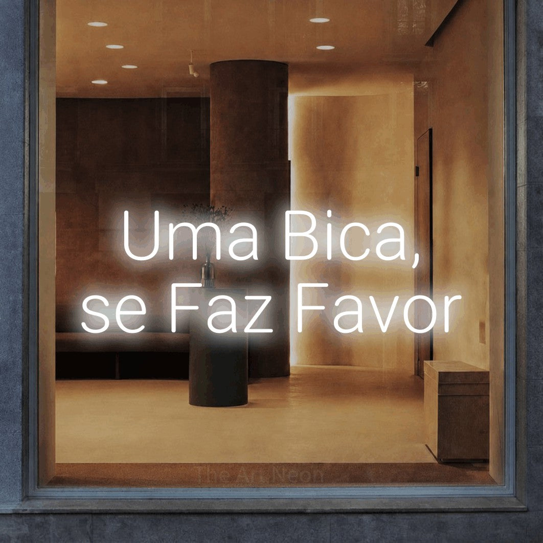 LED neon sign reading “Uma Bica, se Faz Favor”, arranged in 2 lines.