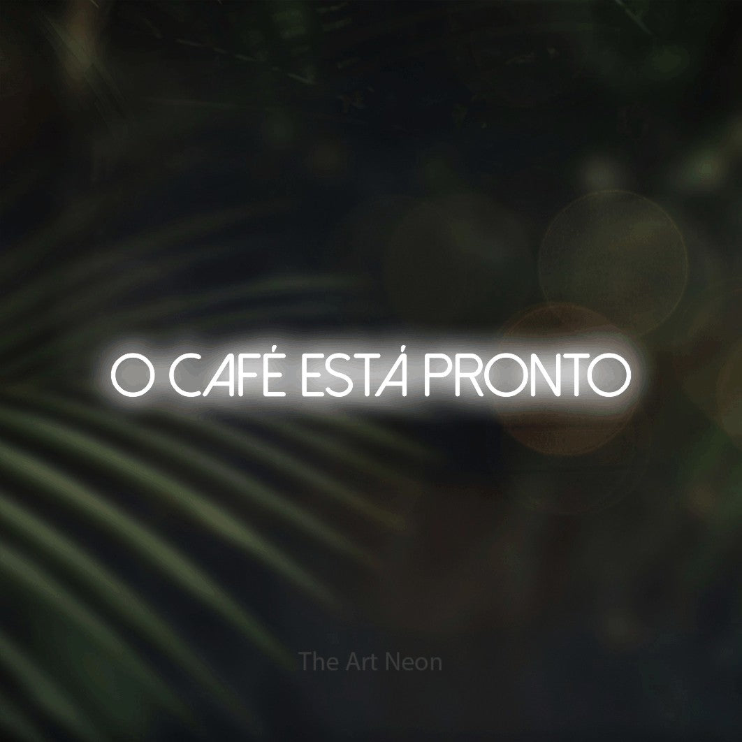 LED neon sign reading “o café está PRONTO”, arranged in a single line.
