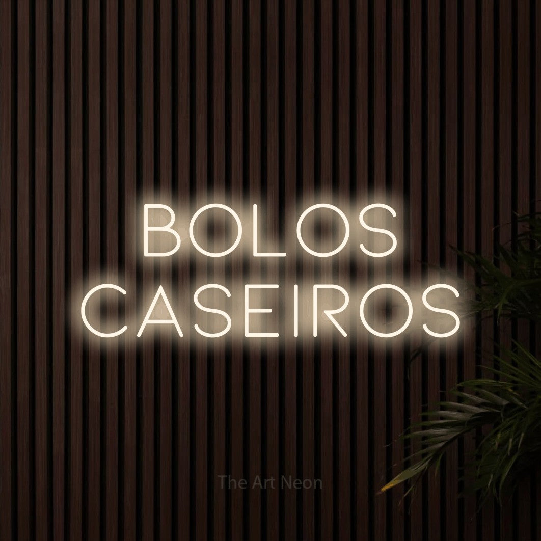 LED neon sign reading “BOLOS CASEIROS”, arranged in 2 lines.