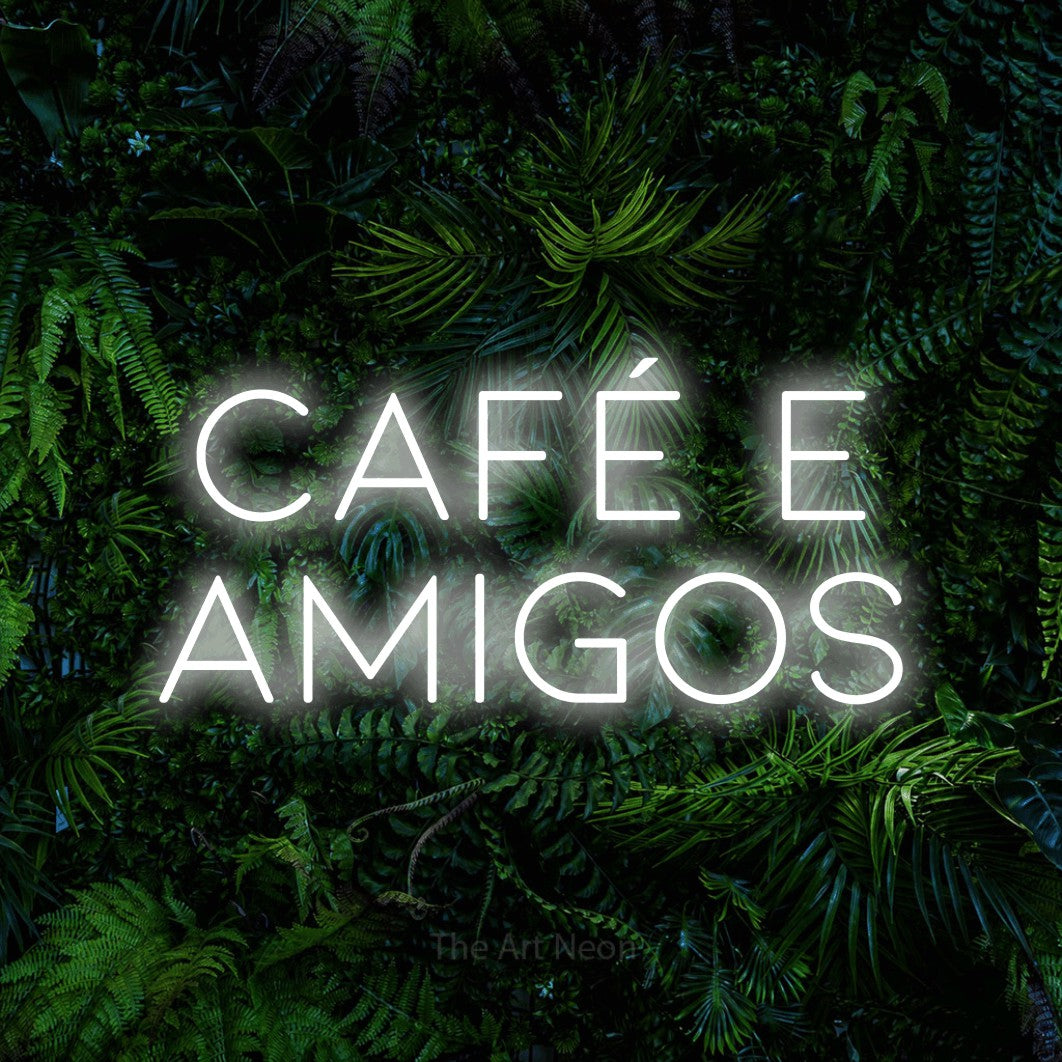 LED neon sign reading “CAFÉ E AMIGOS”, arranged in 2 lines.