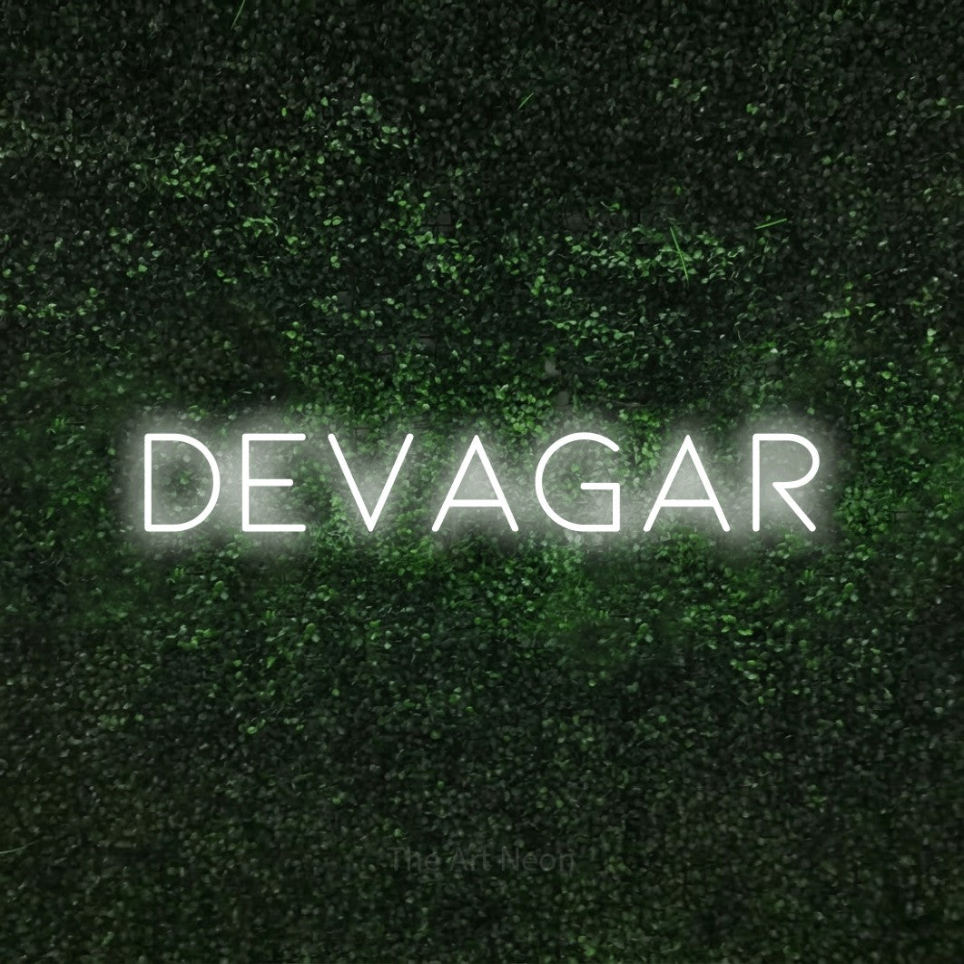 LED neon sign reading “Devagar”, arranged in a single line.