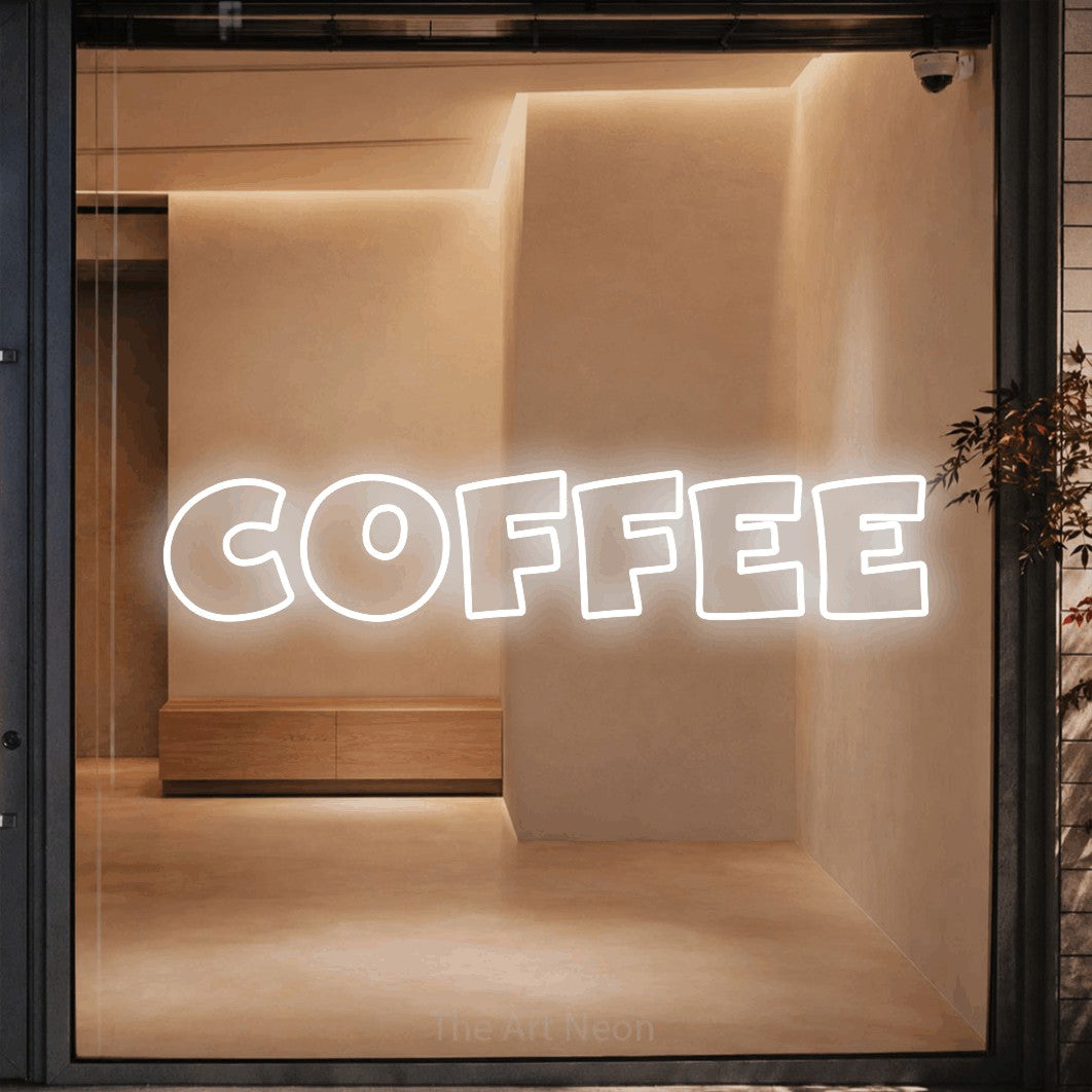 LED neon sign reading “COFFEE”, arranged in a single line.