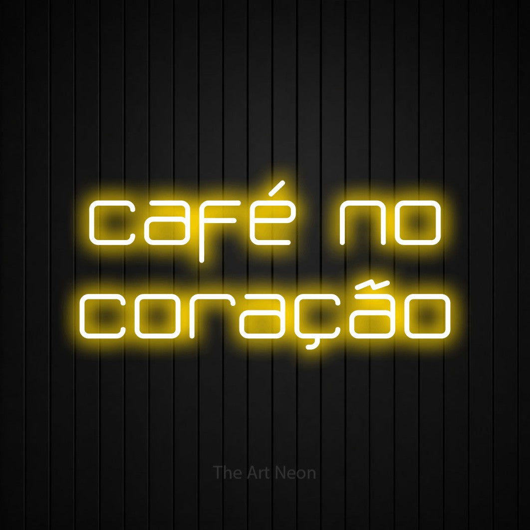 LED neon sign reading “café no coração”, arranged in 2 lines.