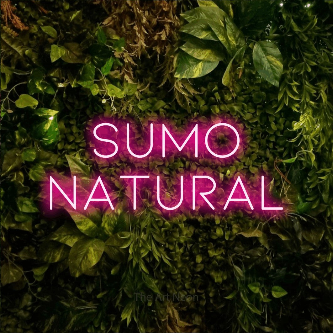 LED neon sign reading “Sumo Natural”, arranged in 2 lines.