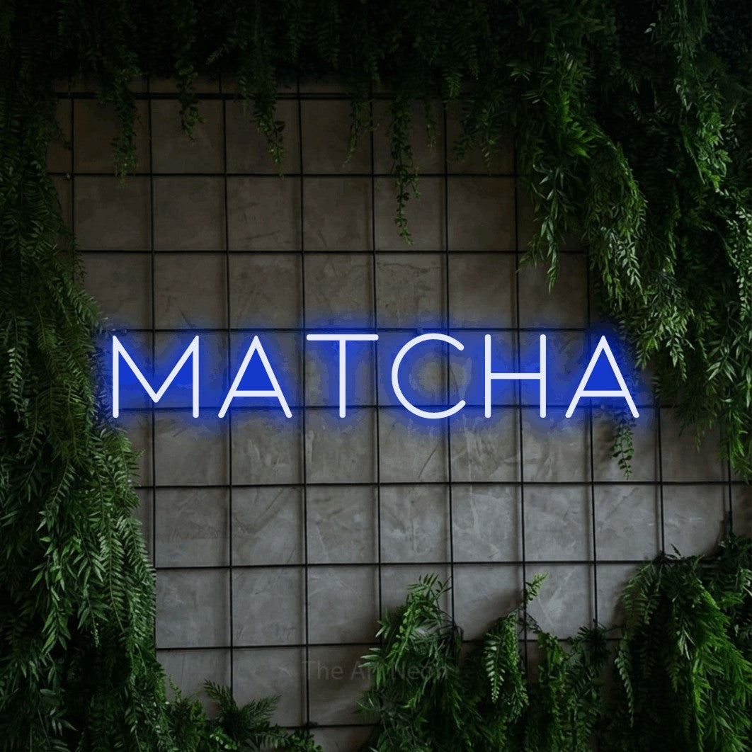 LED neon sign reading “MATCHA”, arranged in a single line.