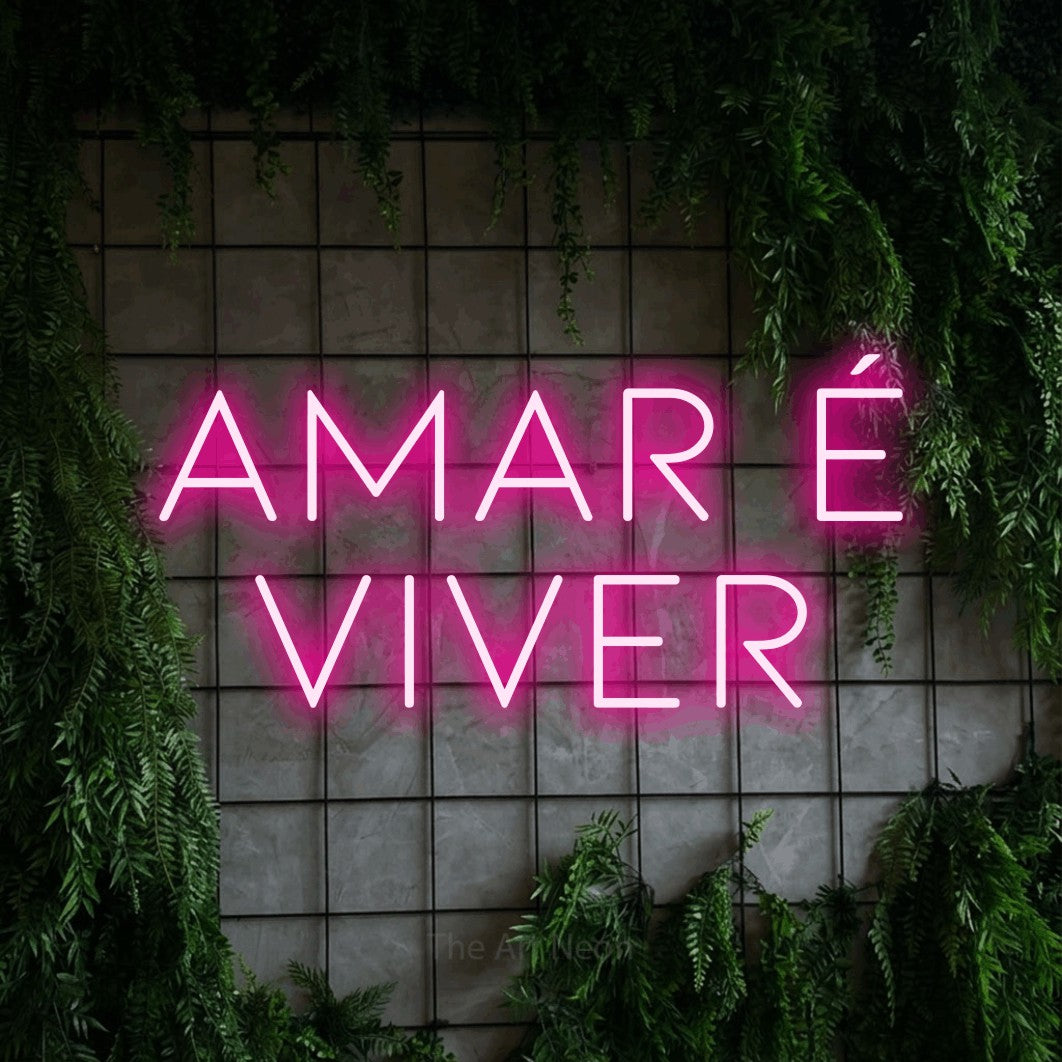 LED neon sign reading “Amar é viver”, arranged in 2 lines.