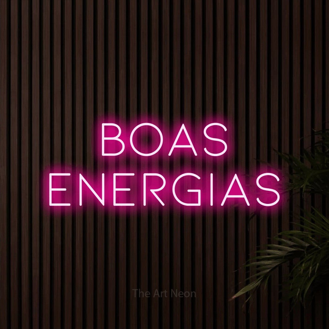 LED neon sign reading “boas energias”, arranged in 2 lines.