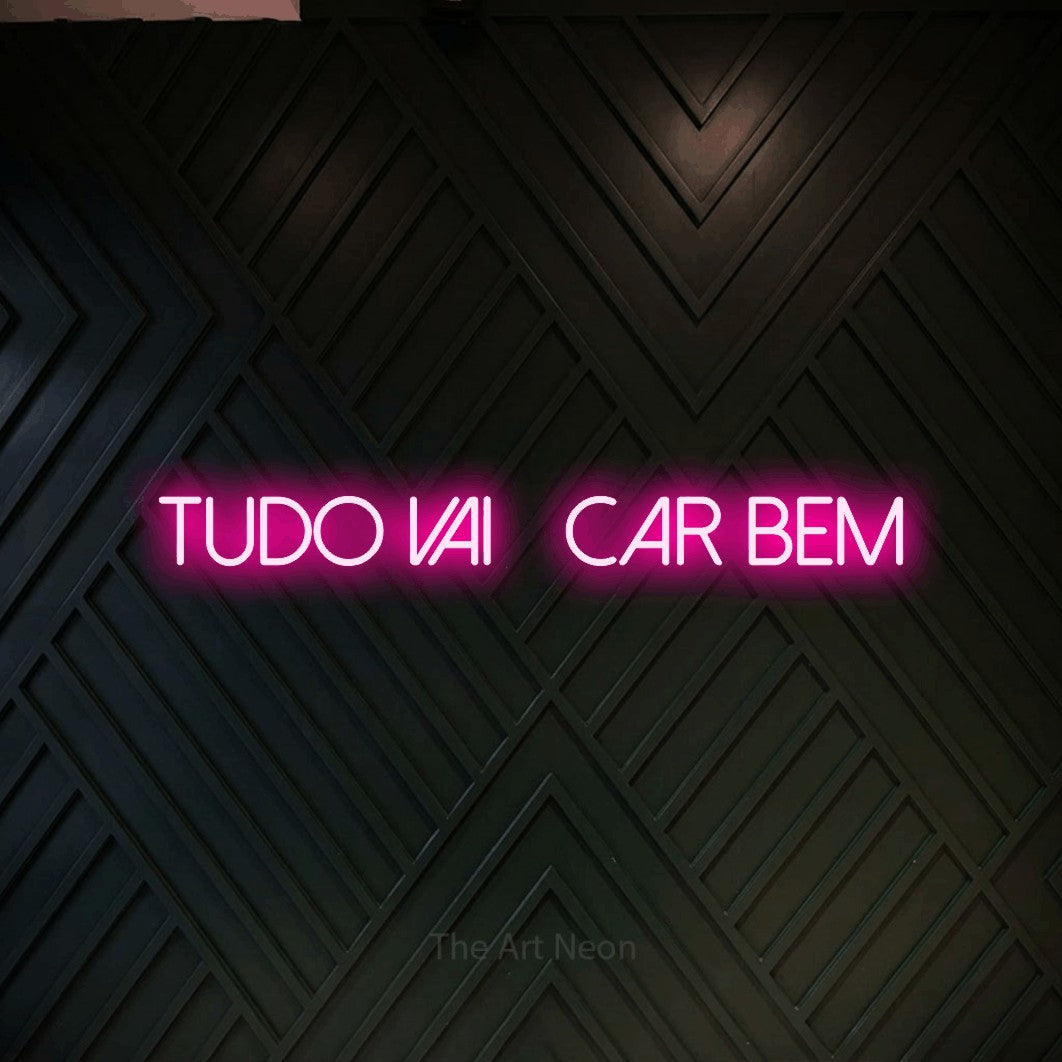 LED neon sign reading “Tudo vai ficar bem”, arranged in a single line.