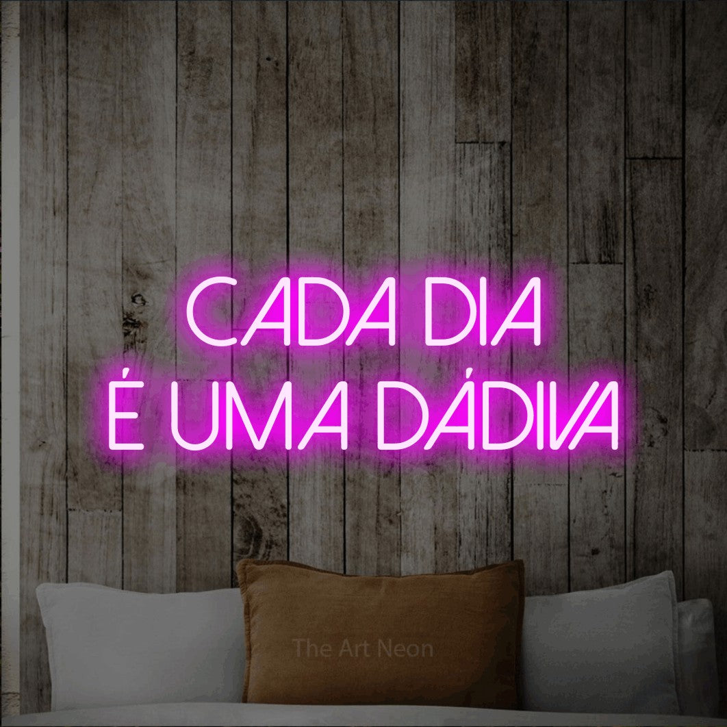 LED neon sign reading “CADA DIA É UMA DÁDIVA”, arranged in 2 lines.