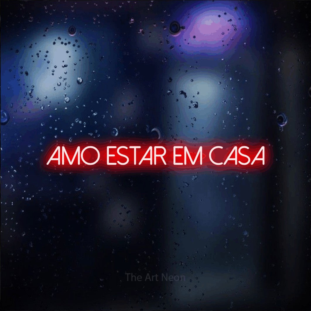 LED neon sign reading “AMO ESTAR EM CASA”, arranged in a single line.