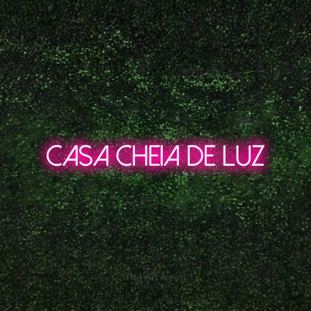 LED neon sign reading “Casa Cheia de Luz”, arranged in a single line.