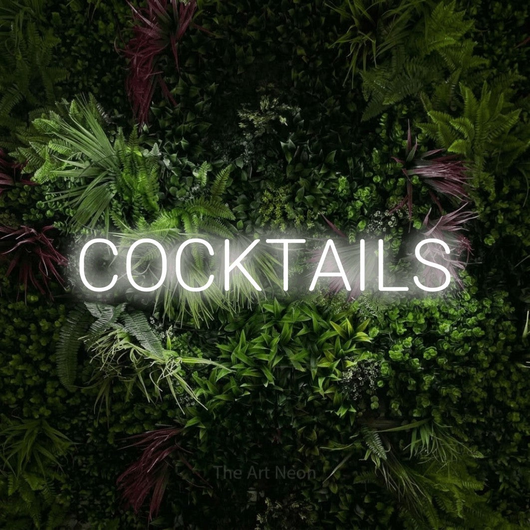 LED neon sign reading “COCKTAILS”, arranged in a single line.