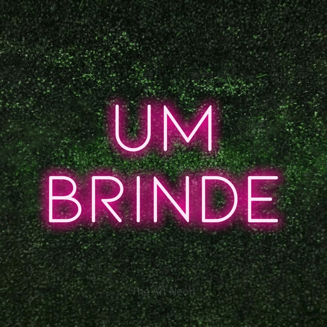 LED neon sign reading “um brinde”, arranged in 2 lines.