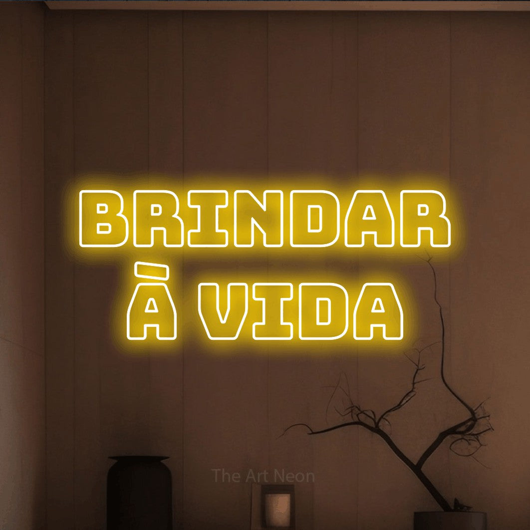 LED neon sign reading “Brindar à Vida”, arranged in 2 lines.