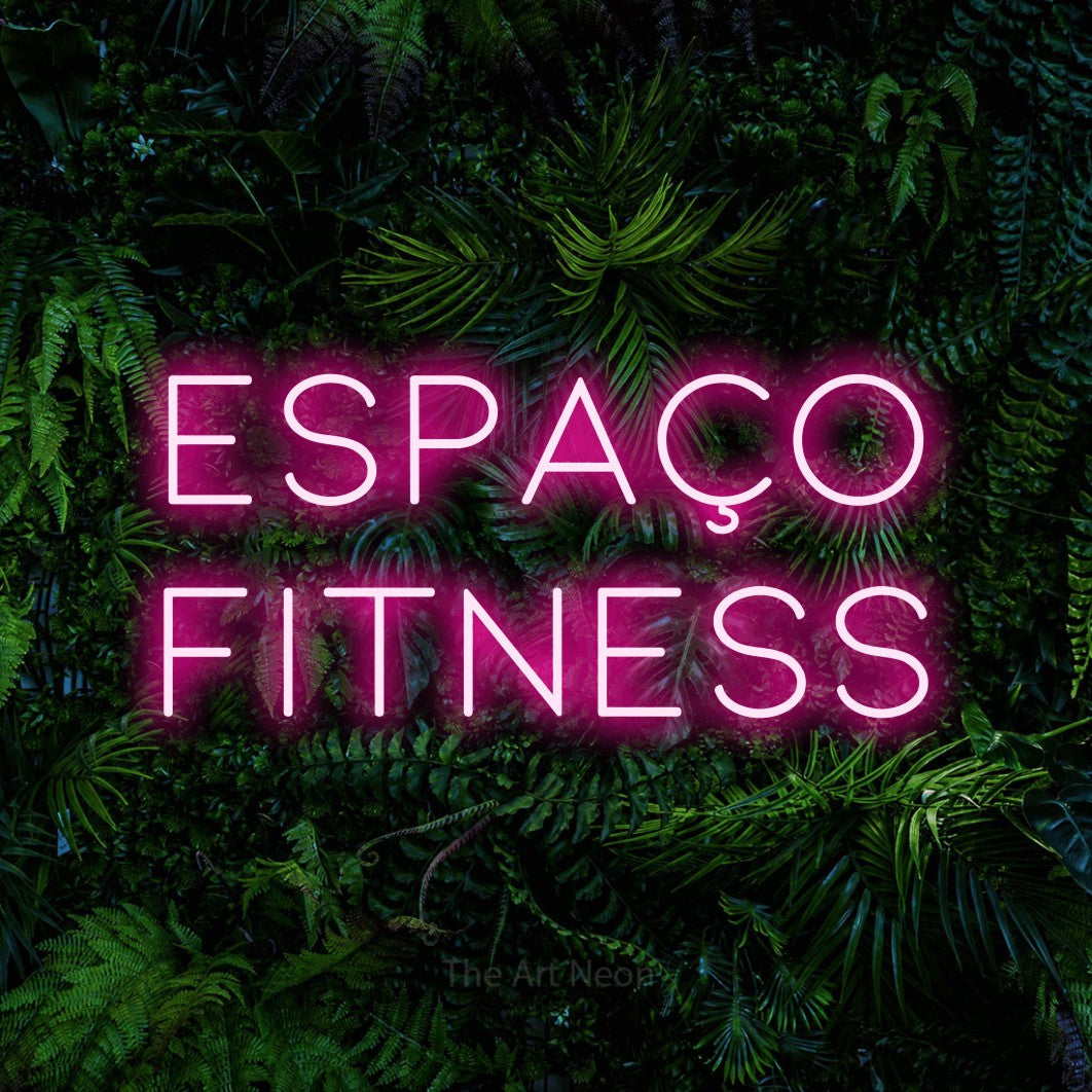 LED neon sign reading “espaço FITNESS”, arranged in 2 lines.