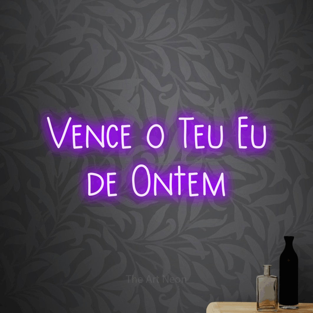 LED neon sign reading “Vence o Teu Eu de Ontem”, arranged in 2 lines.