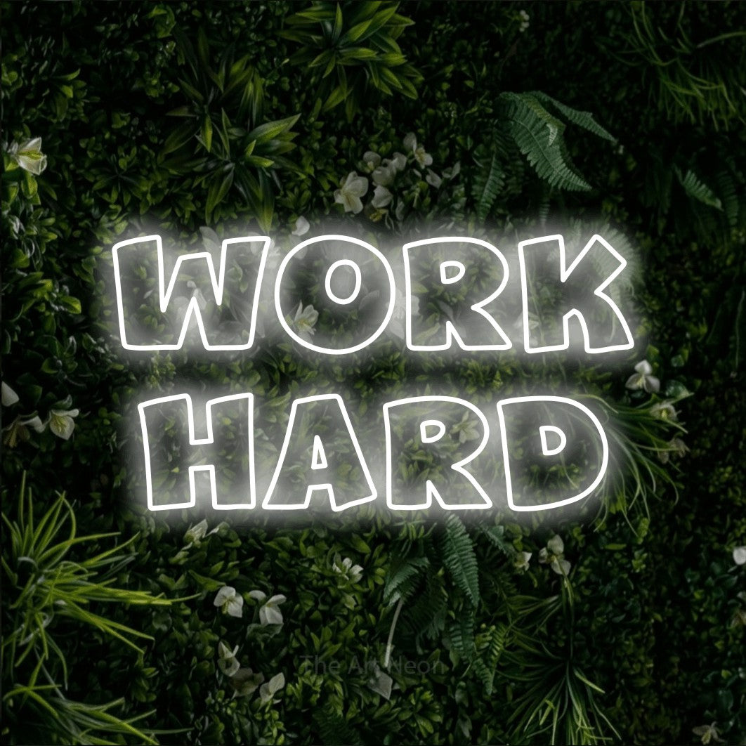 LED neon sign reading “Work Hard”, arranged in 2 lines.