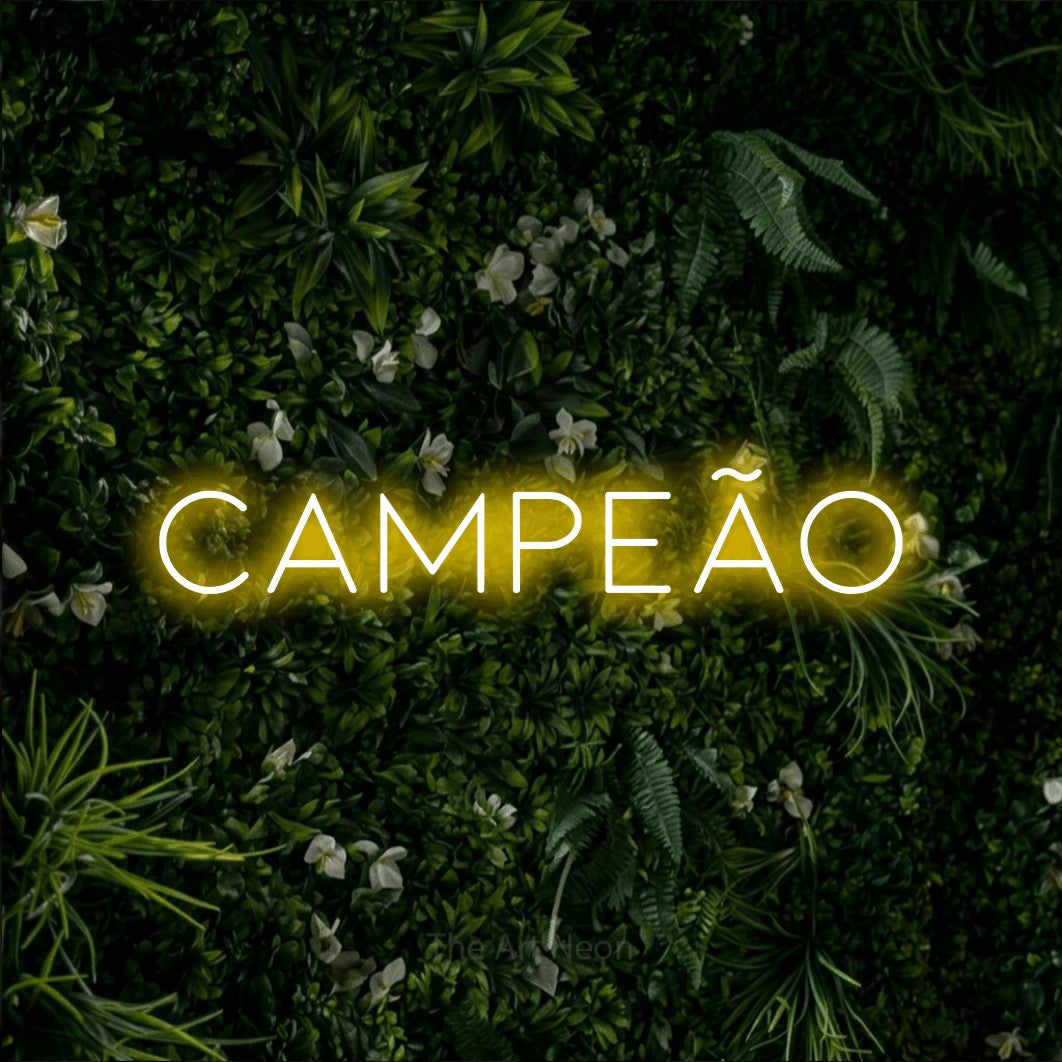 LED neon sign reading “campeão”, arranged in a single line.