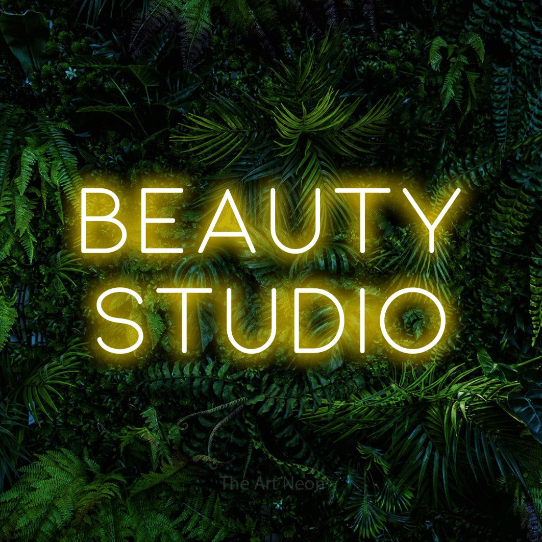 LED neon sign reading “Beauty Studio”, arranged in 2 lines.