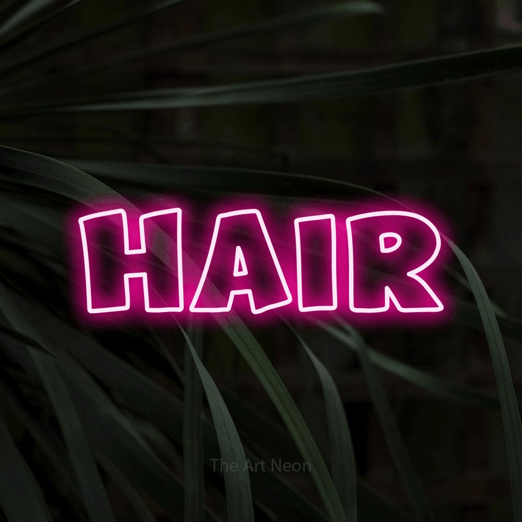 LED neon sign reading “Hair”, arranged in a single line.
