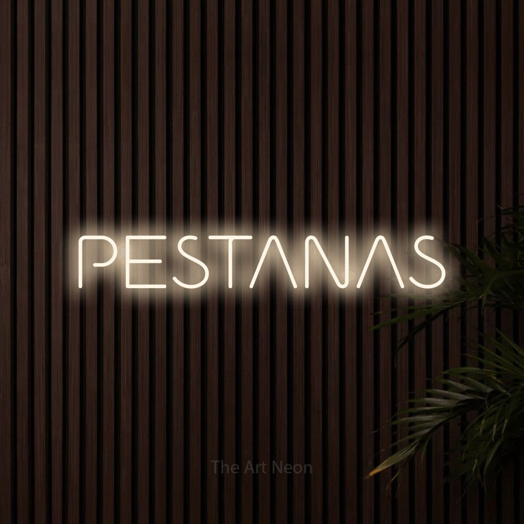 LED neon sign reading “PESTANAS”, arranged in a single line.